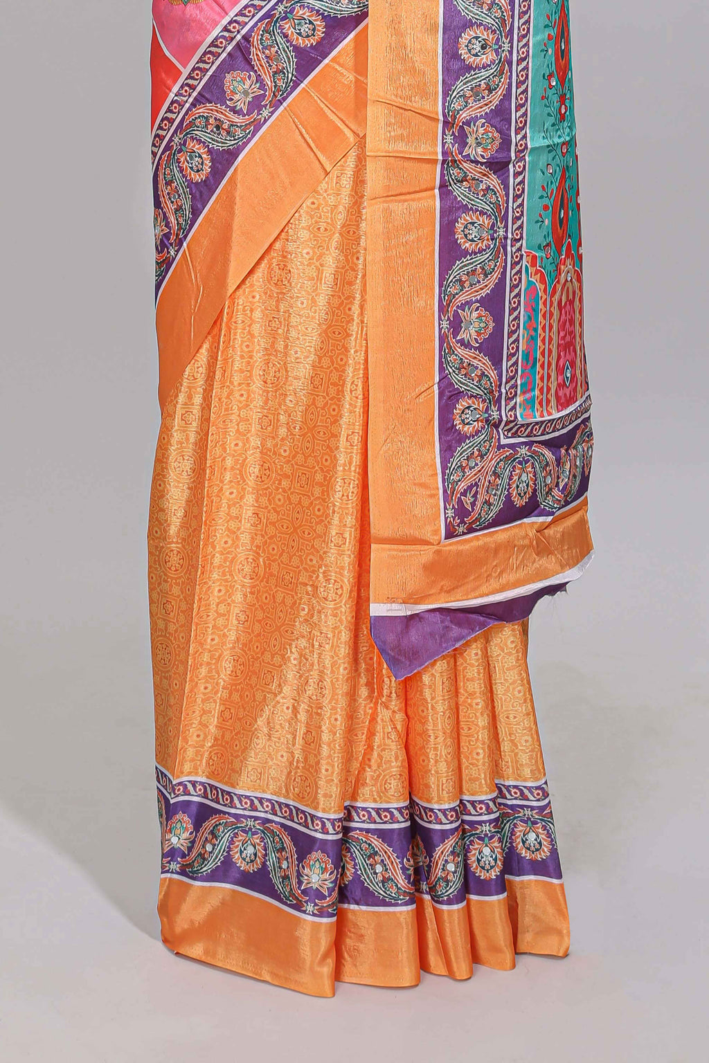 Orange floral design mirror work masakali saree with self border and contrast motifs blouse
