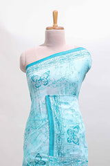 Turquoise green butterfly motifs design mul mul cotton saree with self border and matching warli print blouse