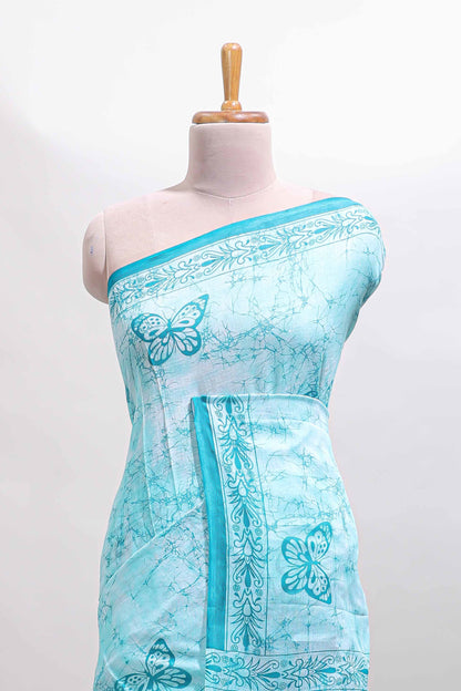 Turquoise green butterfly motifs design mul mul cotton saree with self border and matching warli print blouse