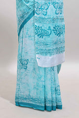 Turquoise green butterfly motifs design mul mul cotton saree with self border and matching warli print blouse
