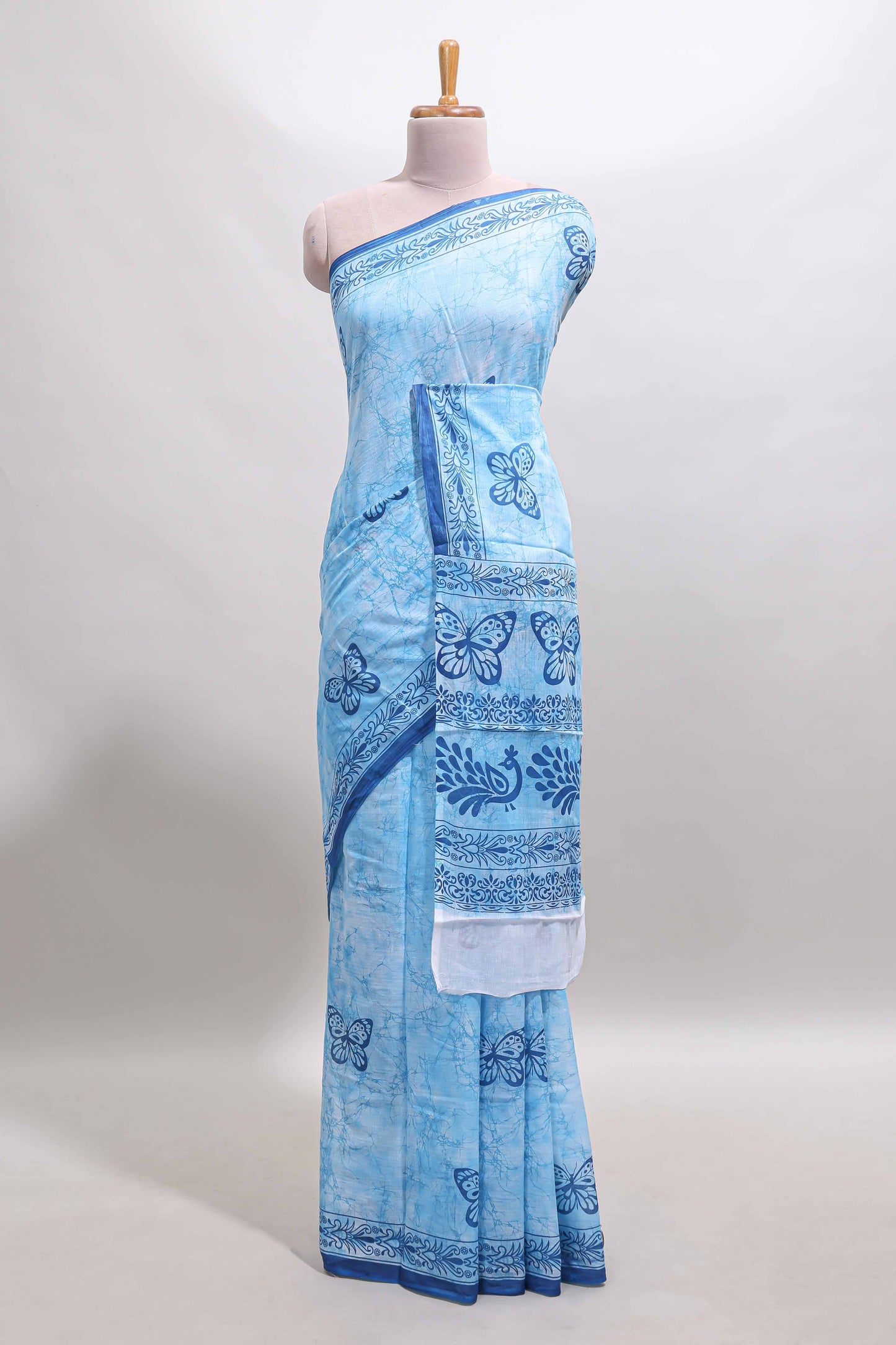 Blue butterfly motifs design mul mul cotton saree with self border and matching warli print blouse
