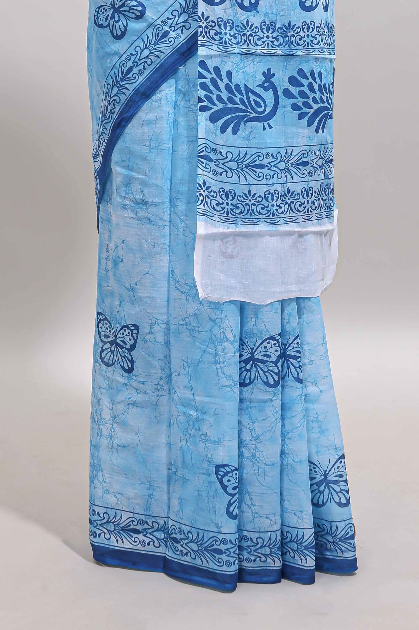 Blue butterfly motifs design mul mul cotton saree with self border and matching warli print blouse