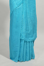 Blue mirror work embroidery design mul mul cotton saree with self scallop border and contrast multi color blouse