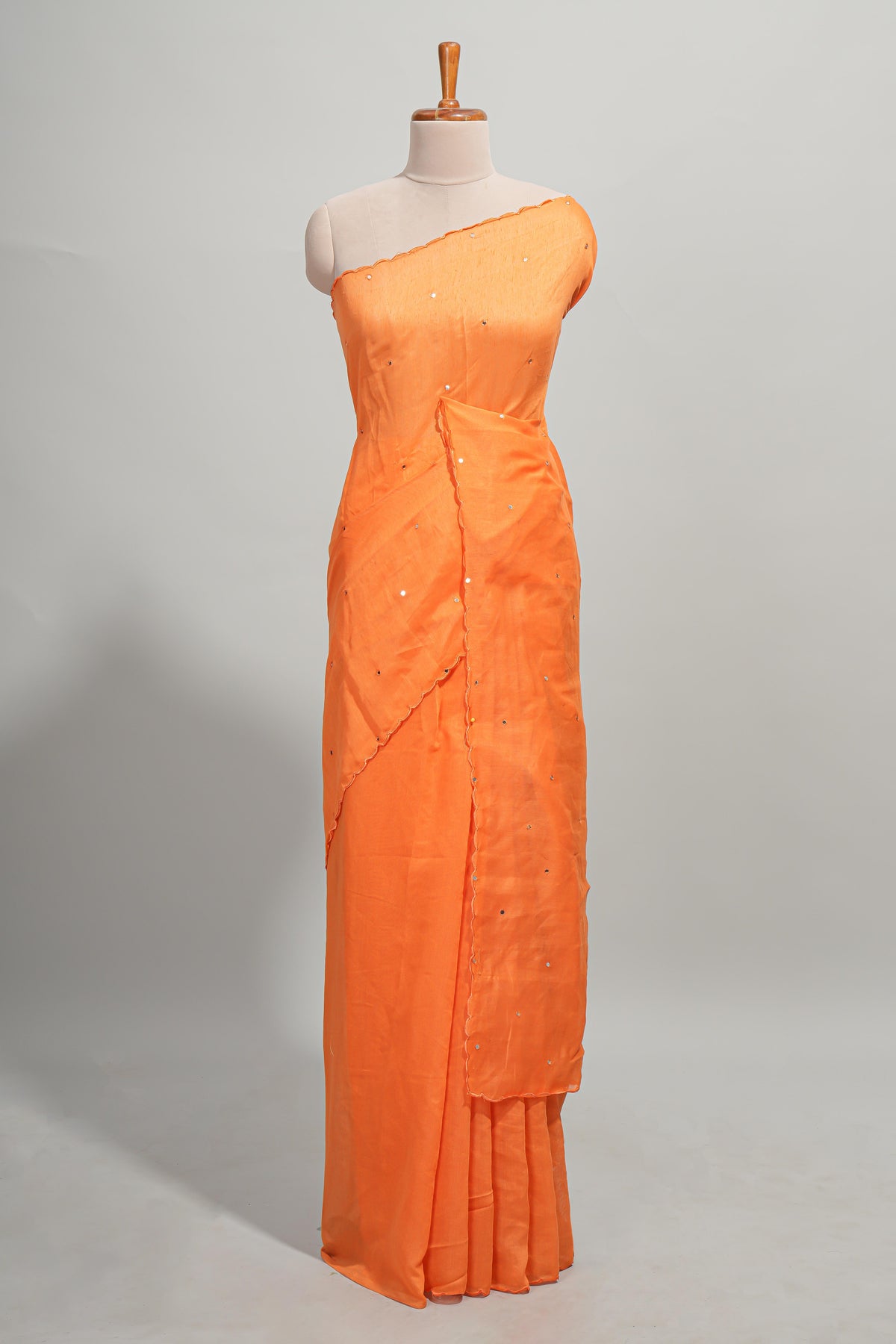 Orange green mirror work embroidery design mul mul cotton saree with self scallop border and contrast multi color blouse