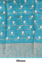 Green checked floral design marsh mellow saree with self zari border and matching blouse