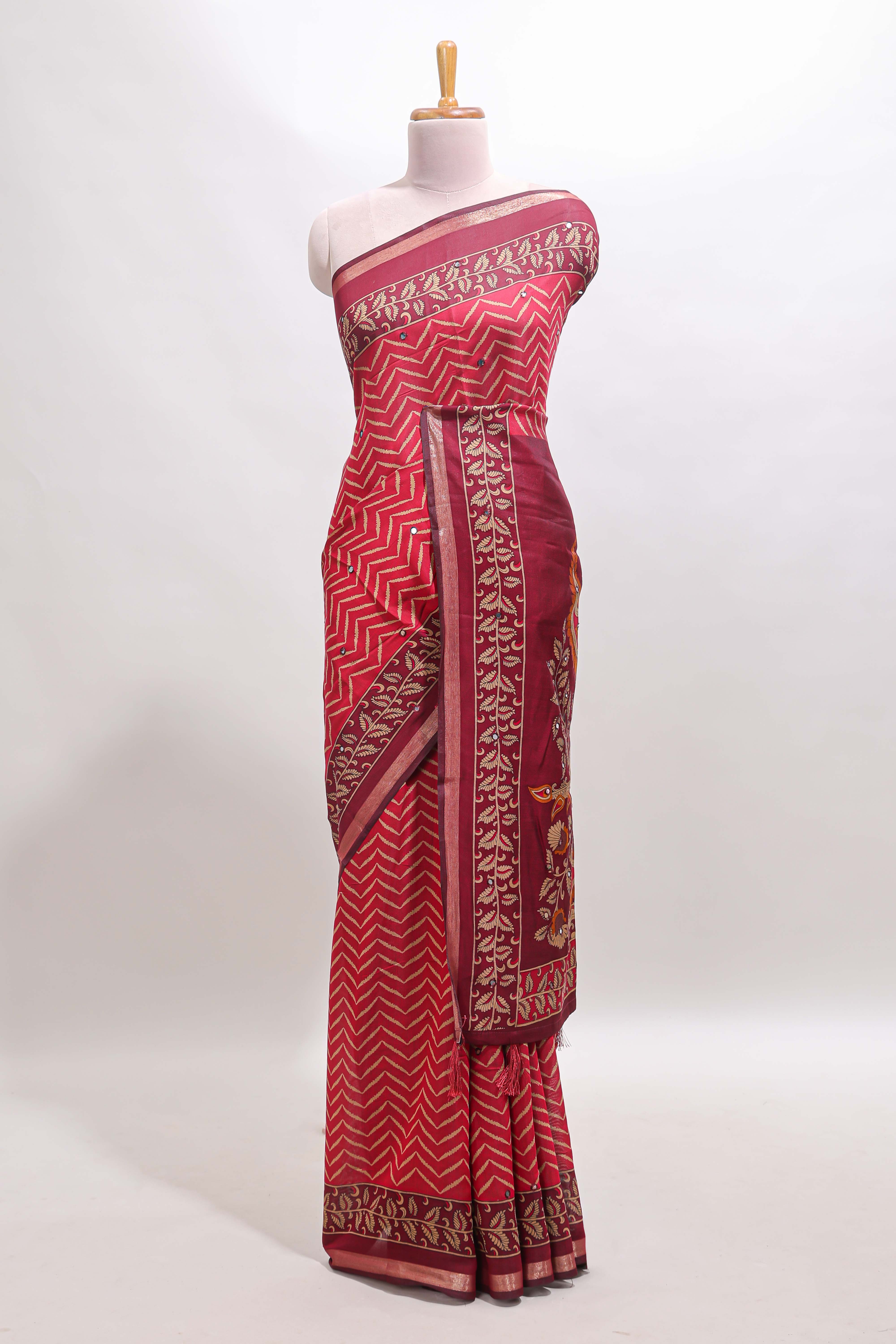 Maroon chevron print marsh mellow saree with contrast zari border and contrast blouse
