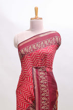 Maroon chevron print marsh mellow saree with contrast zari border and contrast blouse