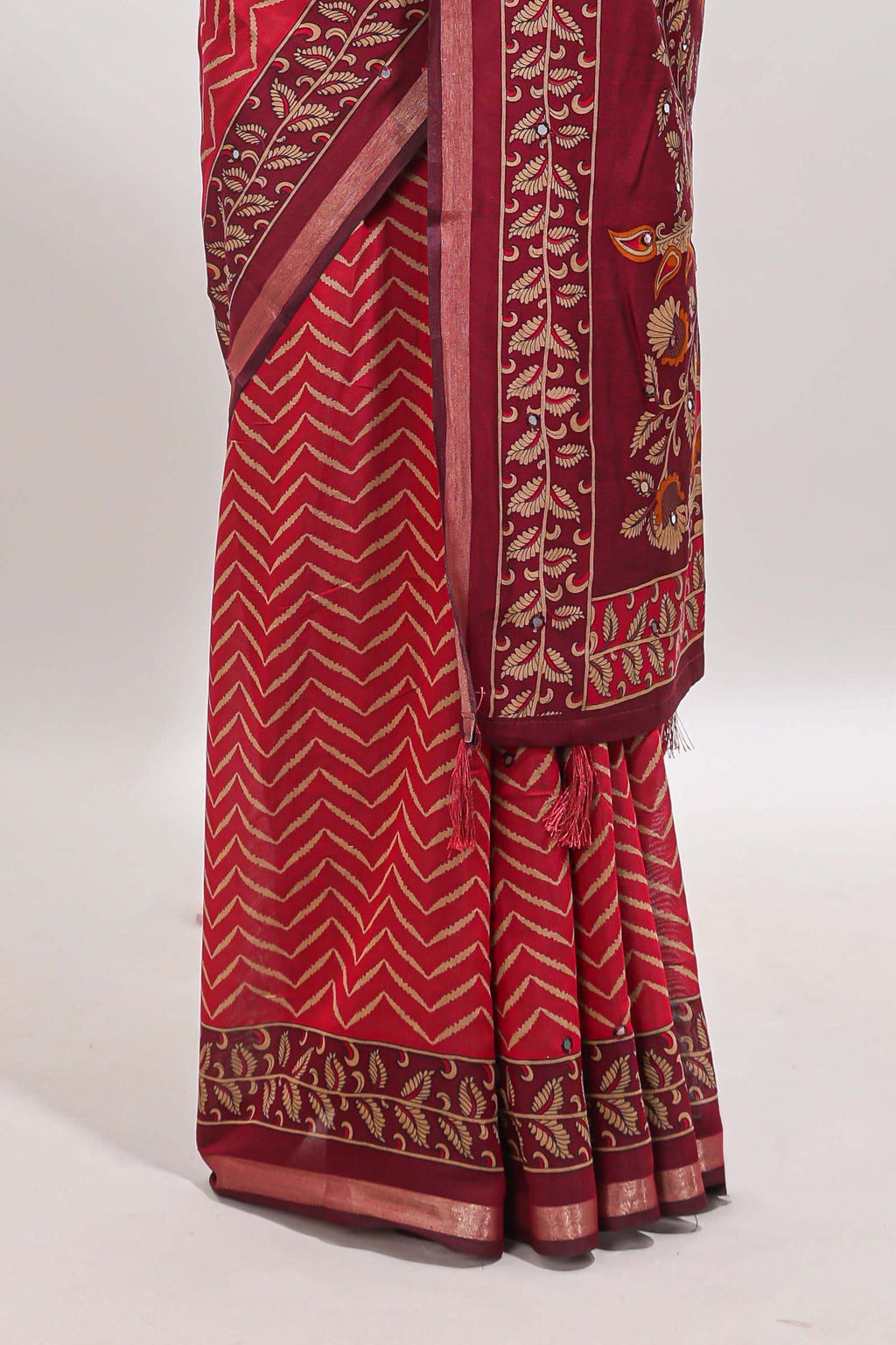 Maroon chevron print marsh mellow saree with contrast zari border and contrast blouse