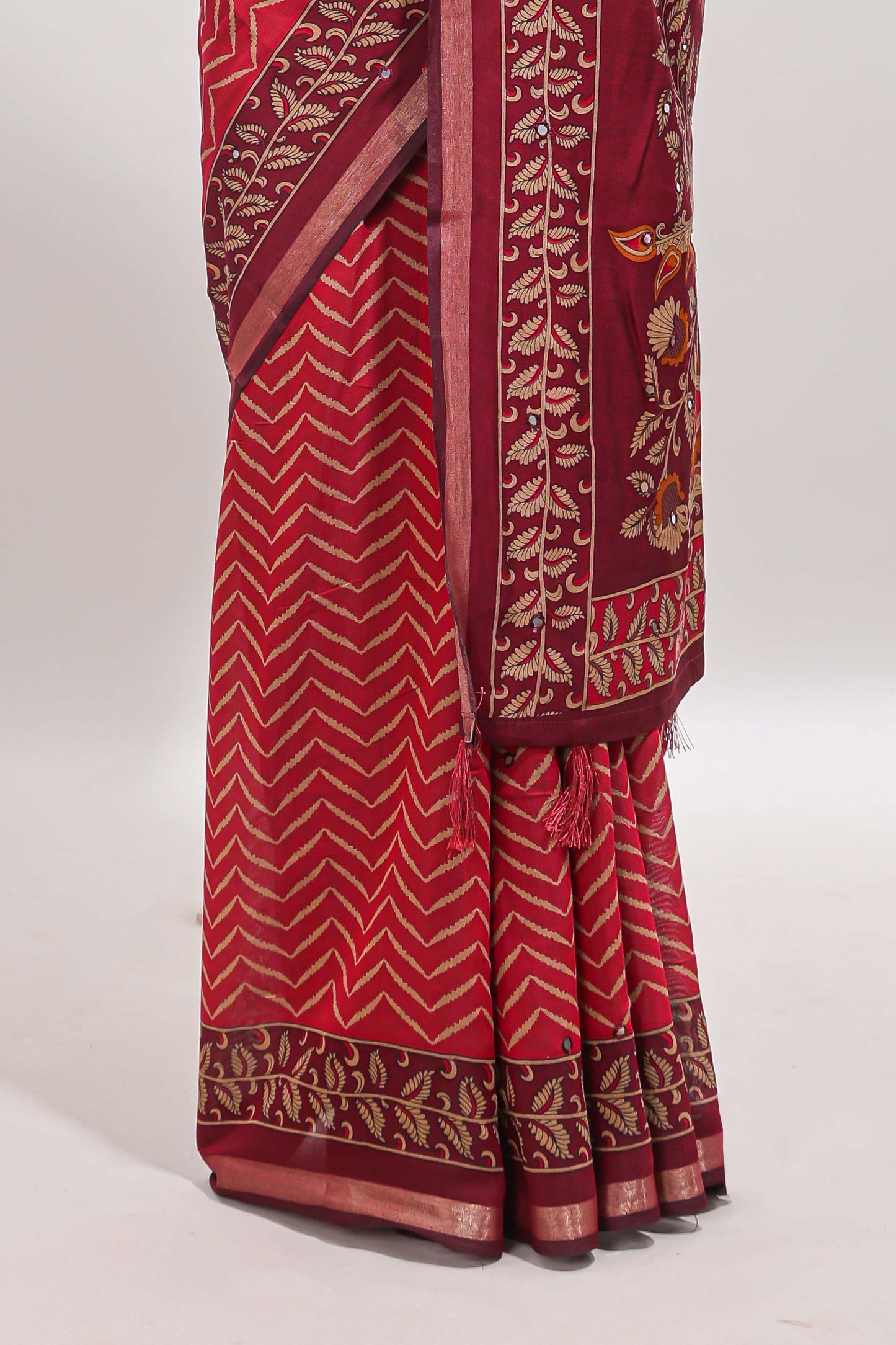Maroon chevron print marsh mellow saree with contrast zari border and contrast blouse