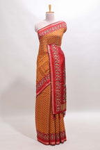 Mustard yellow chevron print marsh mellow saree with contrast zari border and contrast blouse