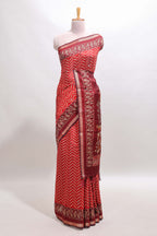 Red chevron print marsh mellow saree with contrast zari border and contrast blouse