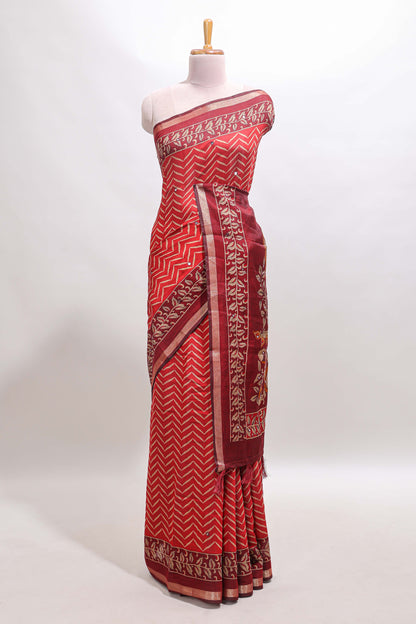 Red chevron print marsh mellow saree with contrast zari border and contrast blouse