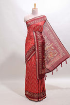Red chevron print marsh mellow saree with contrast zari border and contrast blouse