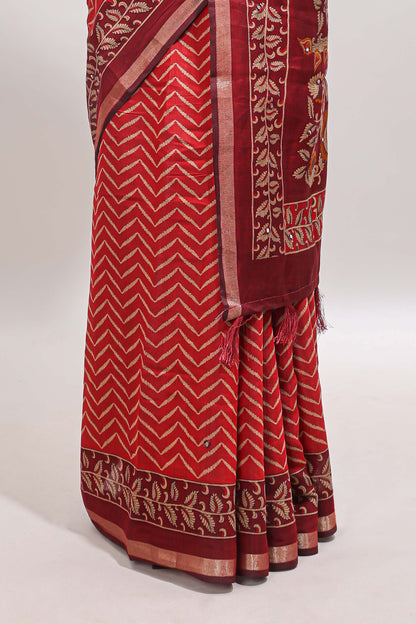 Red chevron print marsh mellow saree with contrast zari border and contrast blouse