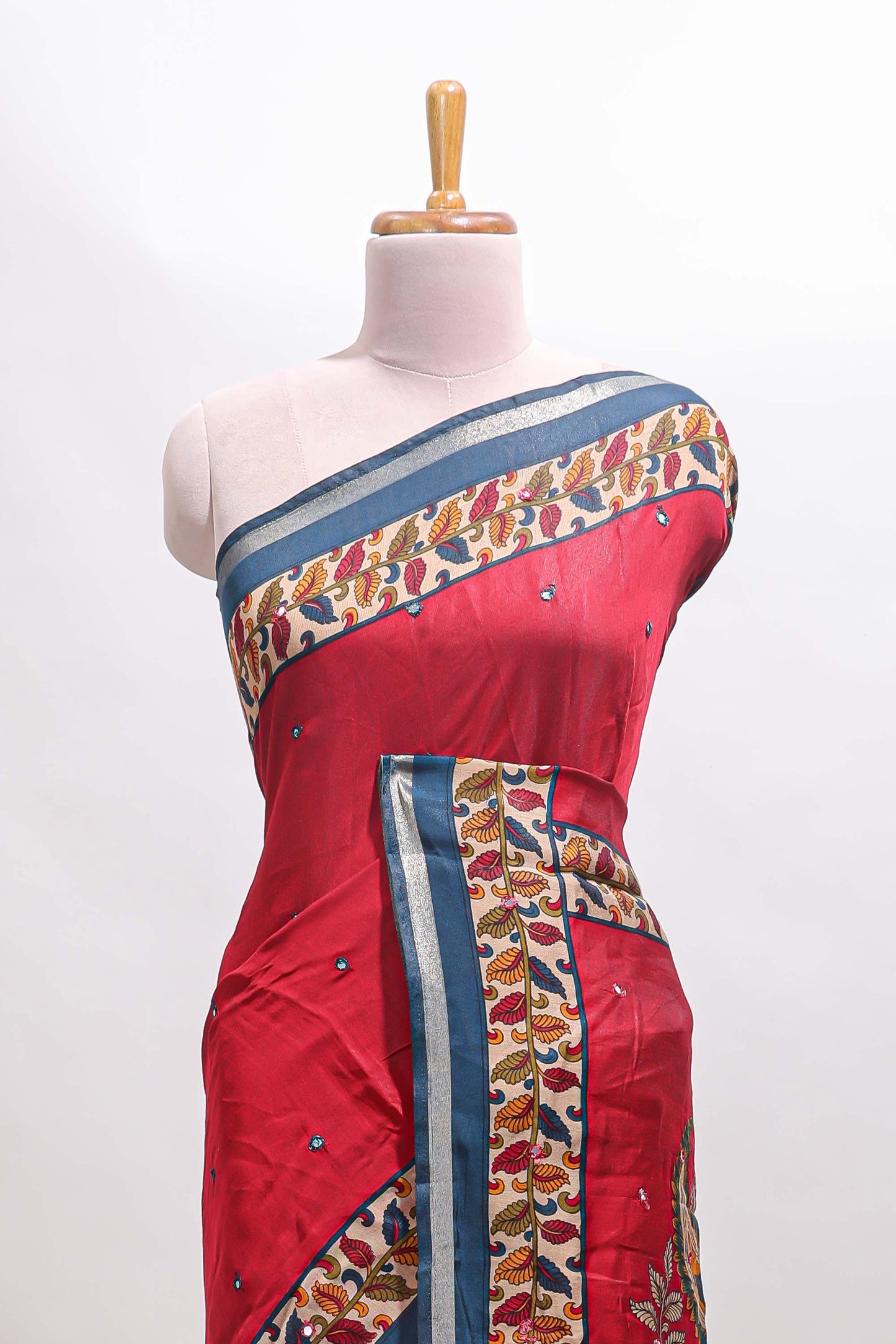 Maroon marsh mellow saree featuring mirror embroidery, contrast floral printed border & blouse