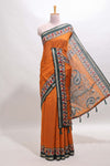 Orange marsh mellow saree featuring mirror embroidery, contrast floral printed border & blouse
