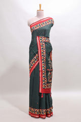 Green marsh mellow saree featuring mirror embroidery, contrast floral printed border & blouse