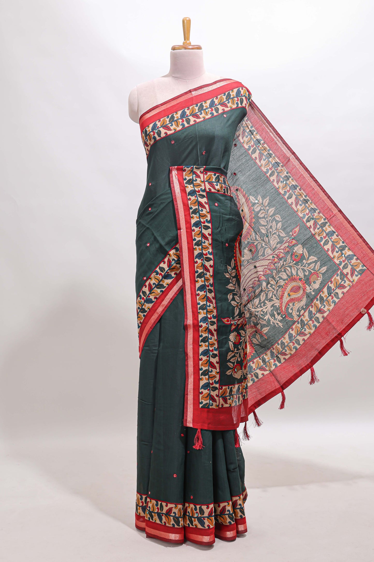 Green marsh mellow saree featuring mirror embroidery, contrast floral printed border & blouse