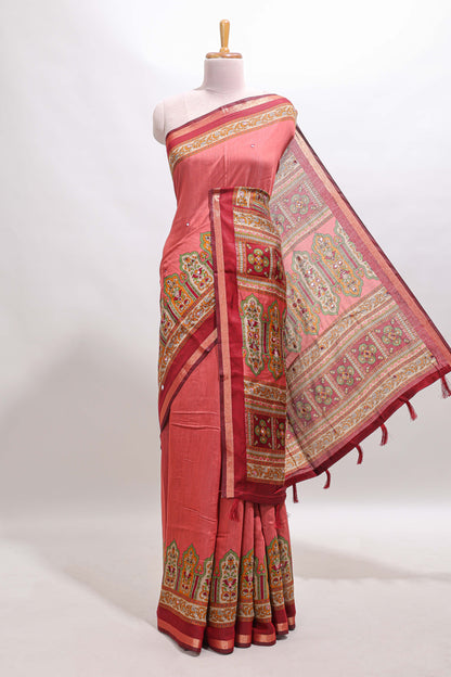 Peach printed marsh mellow saree with contrast floral border and tassel pallu