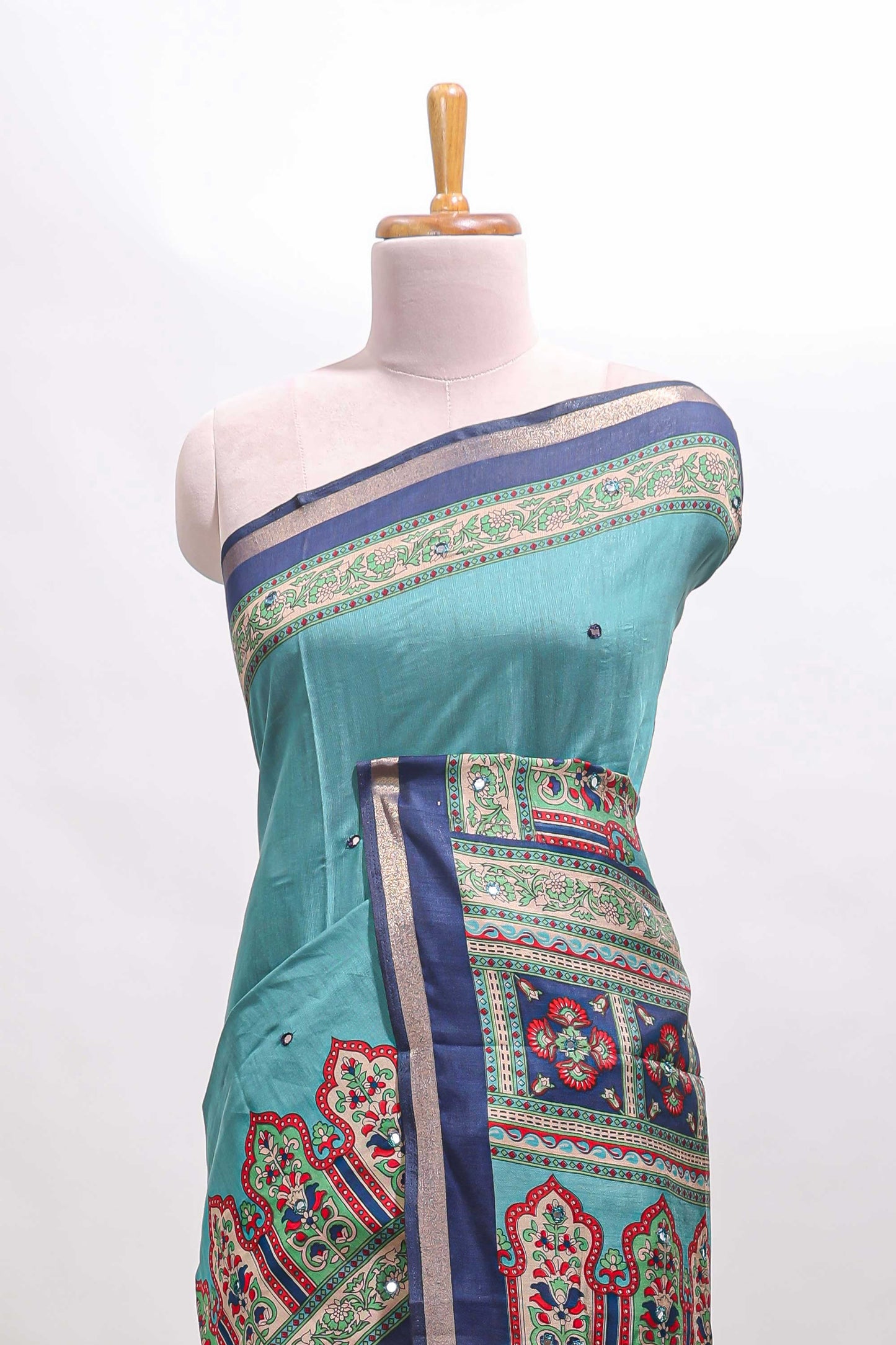 Blue printed marsh mellow saree with contrast floral border and tassel pallu