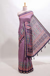 Purple printed marsh mellow saree with contrast floral border and tassel pallu