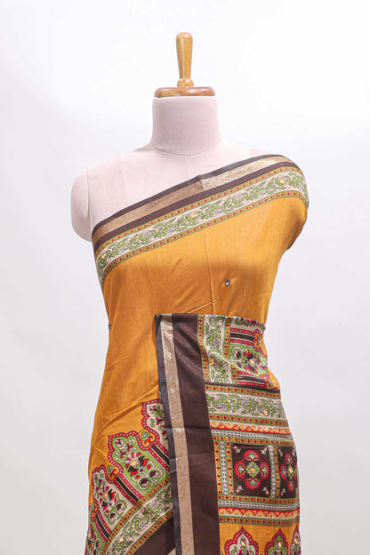 Mustard printed marsh mellow saree with contrast floral border and tassel pallu