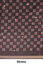 Mustard printed marsh mellow saree with contrast floral border and tassel pallu