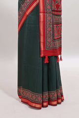 Green embroidery mirror work marsh mellow saree with contrast border and printed blouse