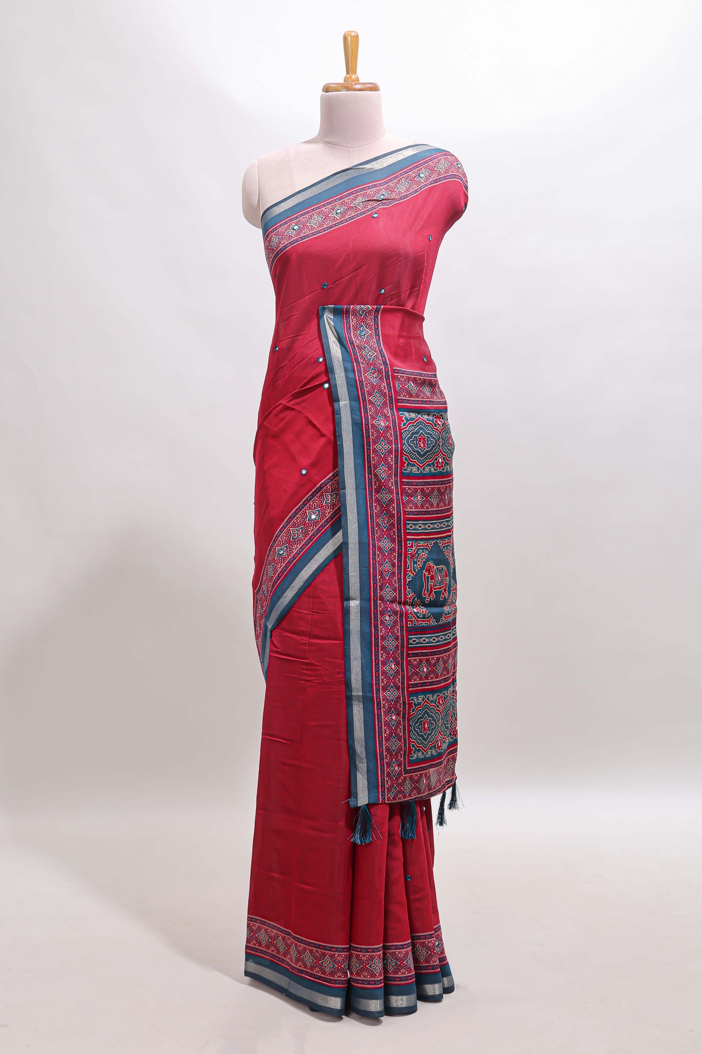 Maroon embroidery mirror work marsh mellow saree with contrast border and printed blouse
