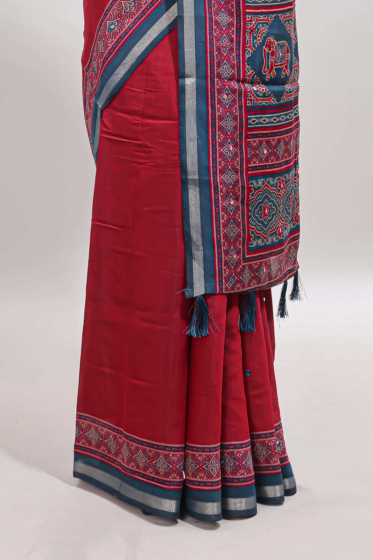 Maroon embroidery mirror work marsh mellow saree with contrast border and printed blouse