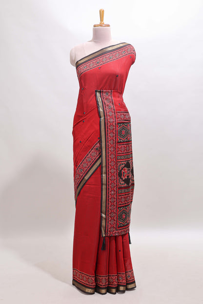 Red embroidery mirror work marsh mellow saree with contrast border and printed blouse