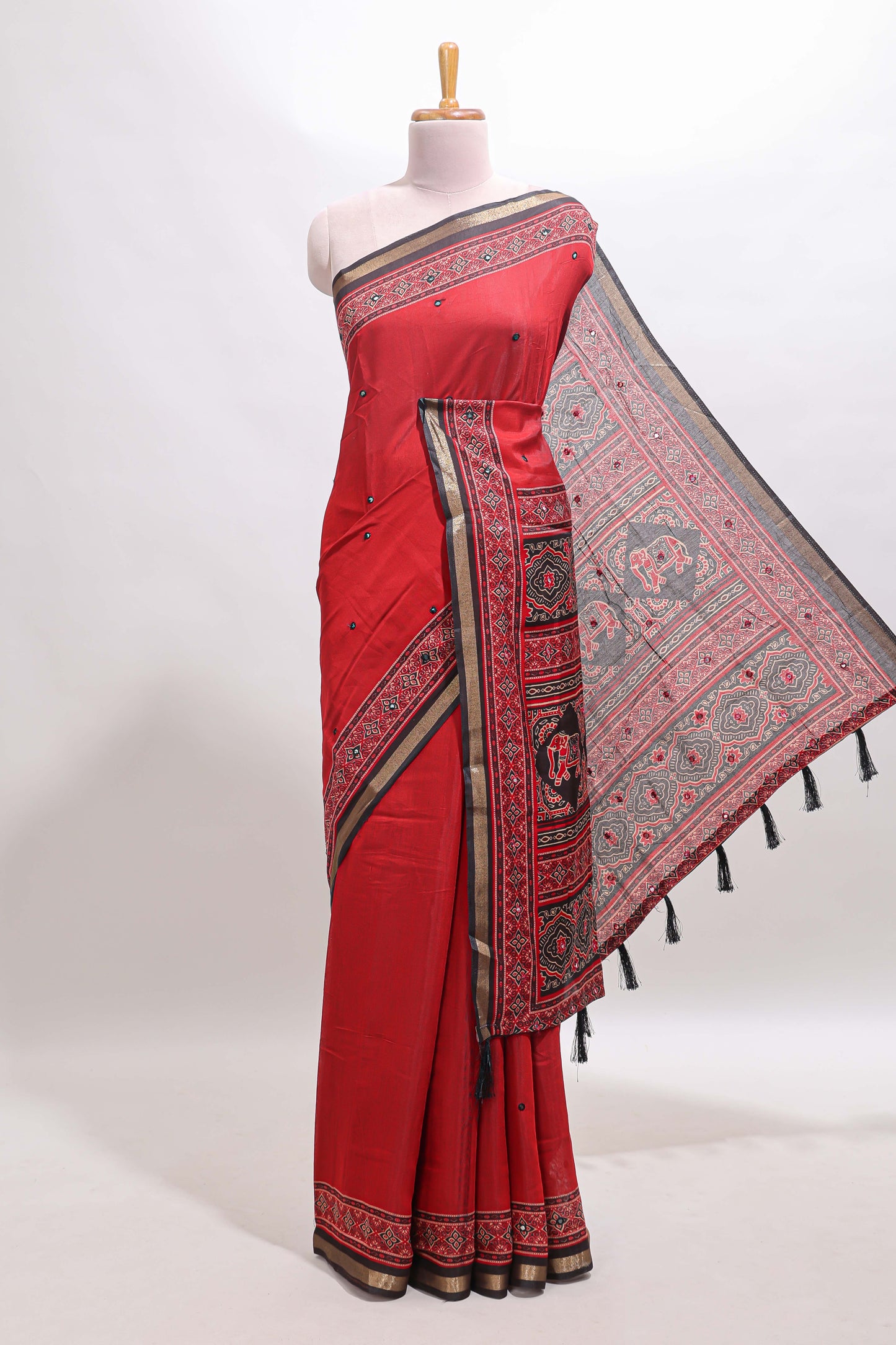 Red embroidery mirror work marsh mellow saree with contrast border and printed blouse