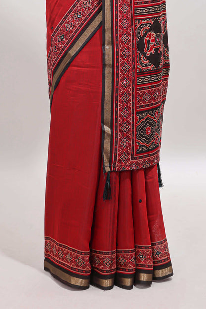 Red embroidery mirror work marsh mellow saree with contrast border and printed blouse
