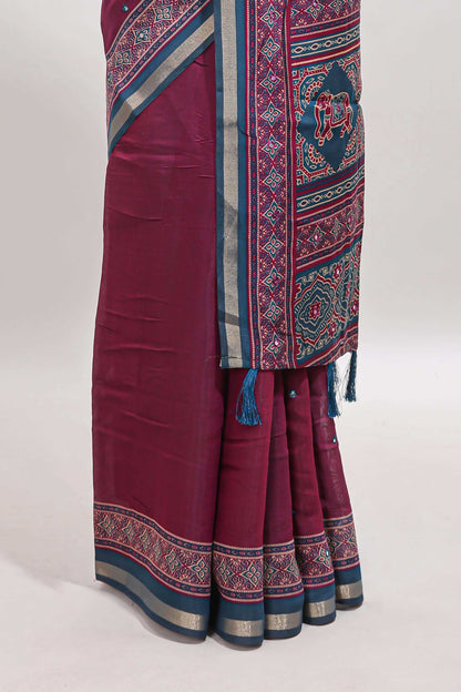 Purple embroidery mirror work marsh mellow saree with contrast border and printed blouse