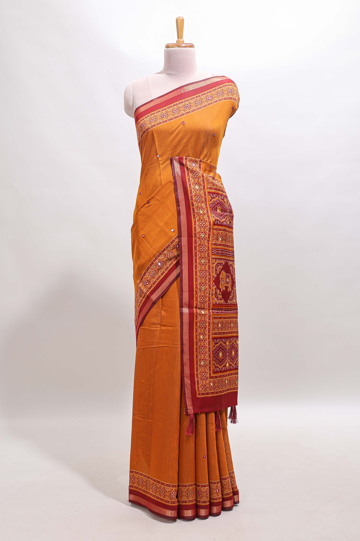 Mustard embroidery mirror work marsh mellow saree with contrast border and printed blouse