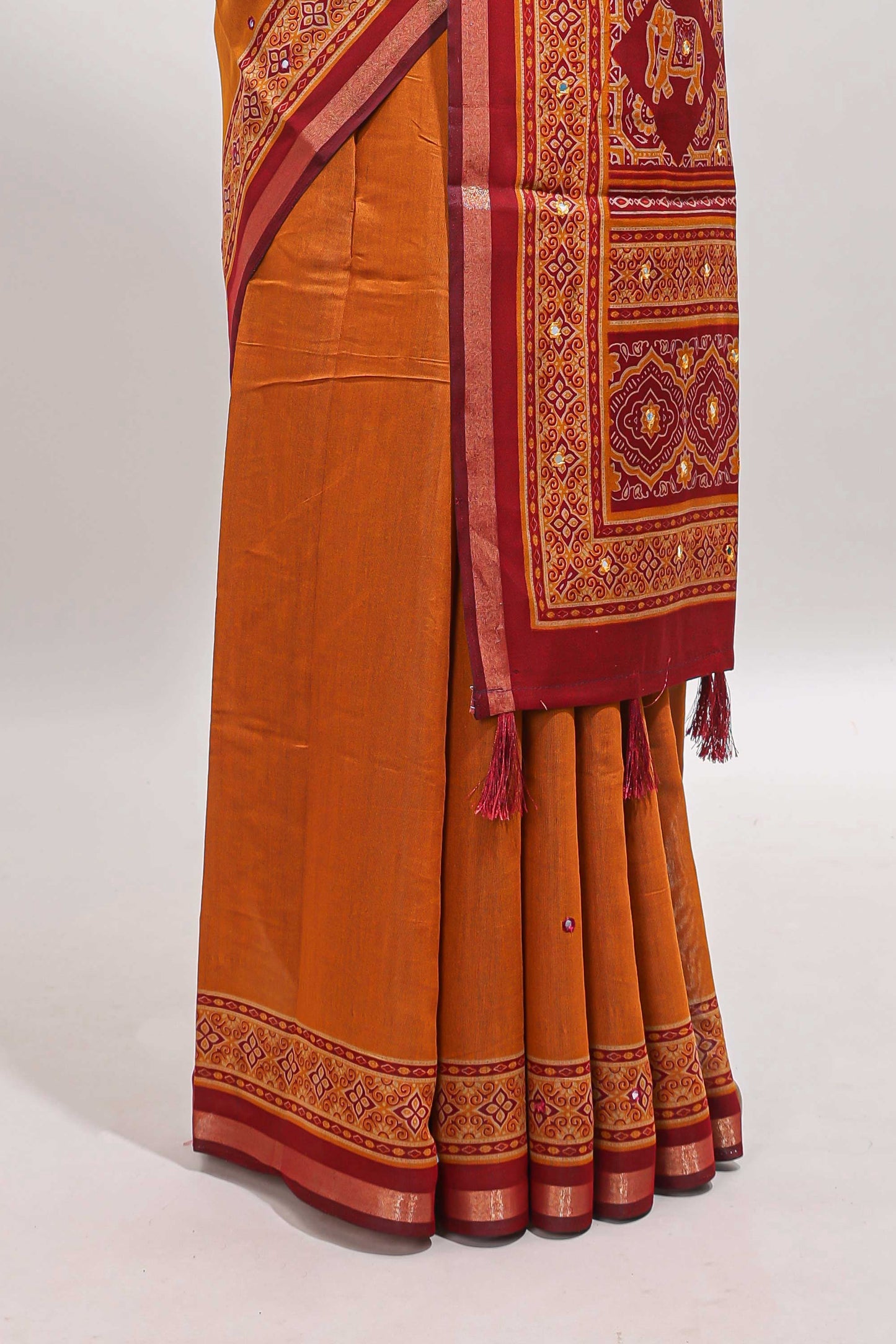 Mustard embroidery mirror work marsh mellow saree with contrast border and printed blouse