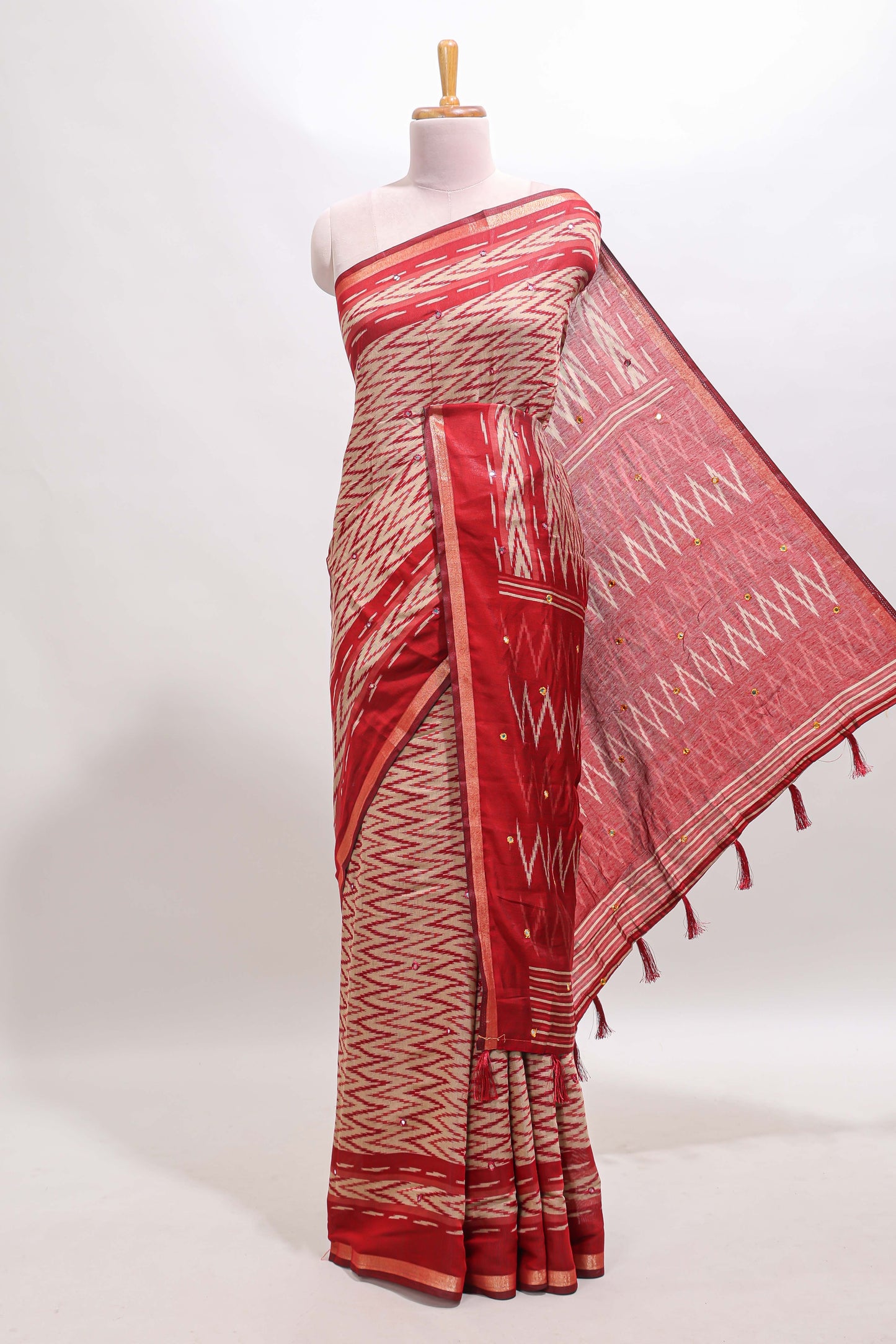 Beige chevron embroidery mirror work marsh mellow saree with contrast red border and printed blouse