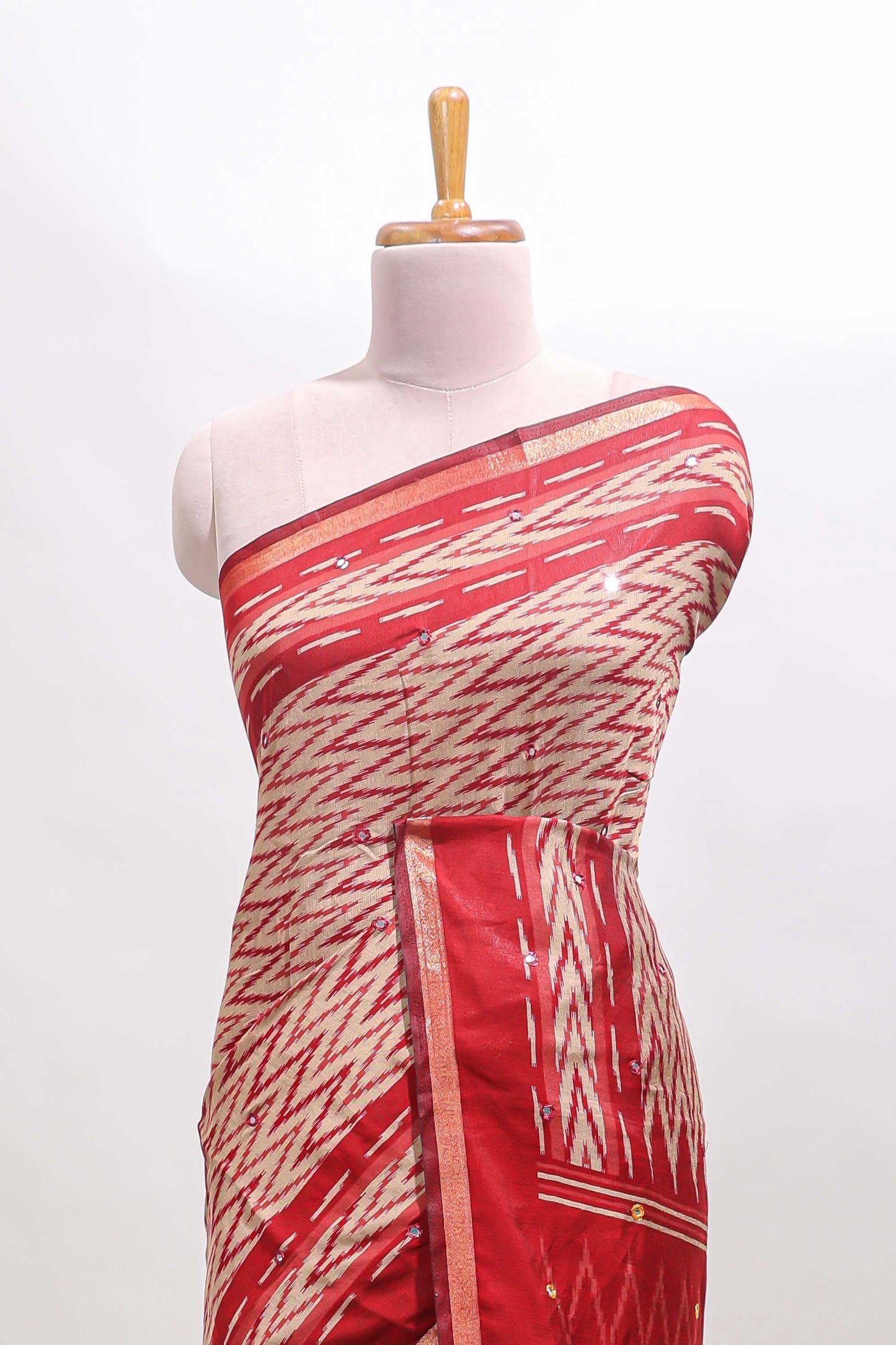Beige chevron embroidery mirror work marsh mellow saree with contrast red border and printed blouse