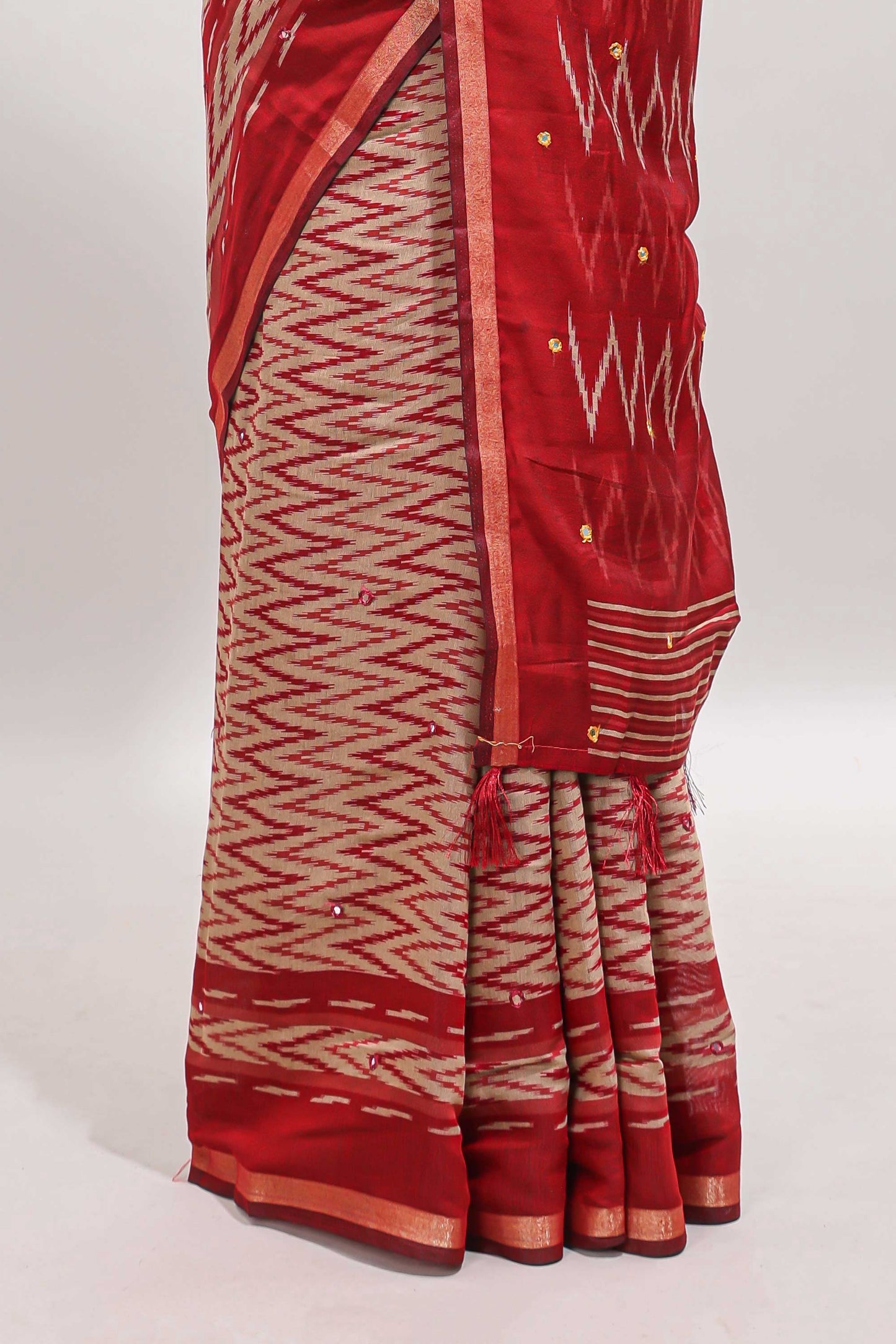 Beige chevron embroidery mirror work marsh mellow saree with contrast red border and printed blouse