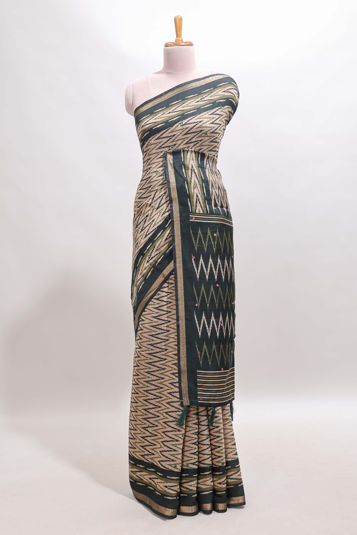 Beige chevron embroidery mirror work marsh mellow saree with contrast green border and printed blouse