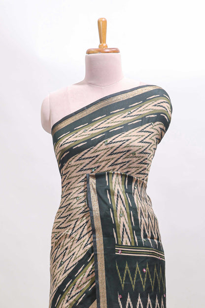 Beige chevron embroidery mirror work marsh mellow saree with contrast green border and printed blouse