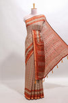 Beige chevron embroidery mirror work marsh mellow saree with contrast orange border and printed blouse
