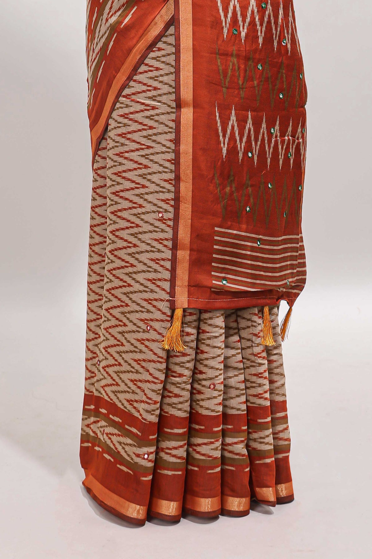 Beige chevron embroidery mirror work marsh mellow saree with contrast orange border and printed blouse