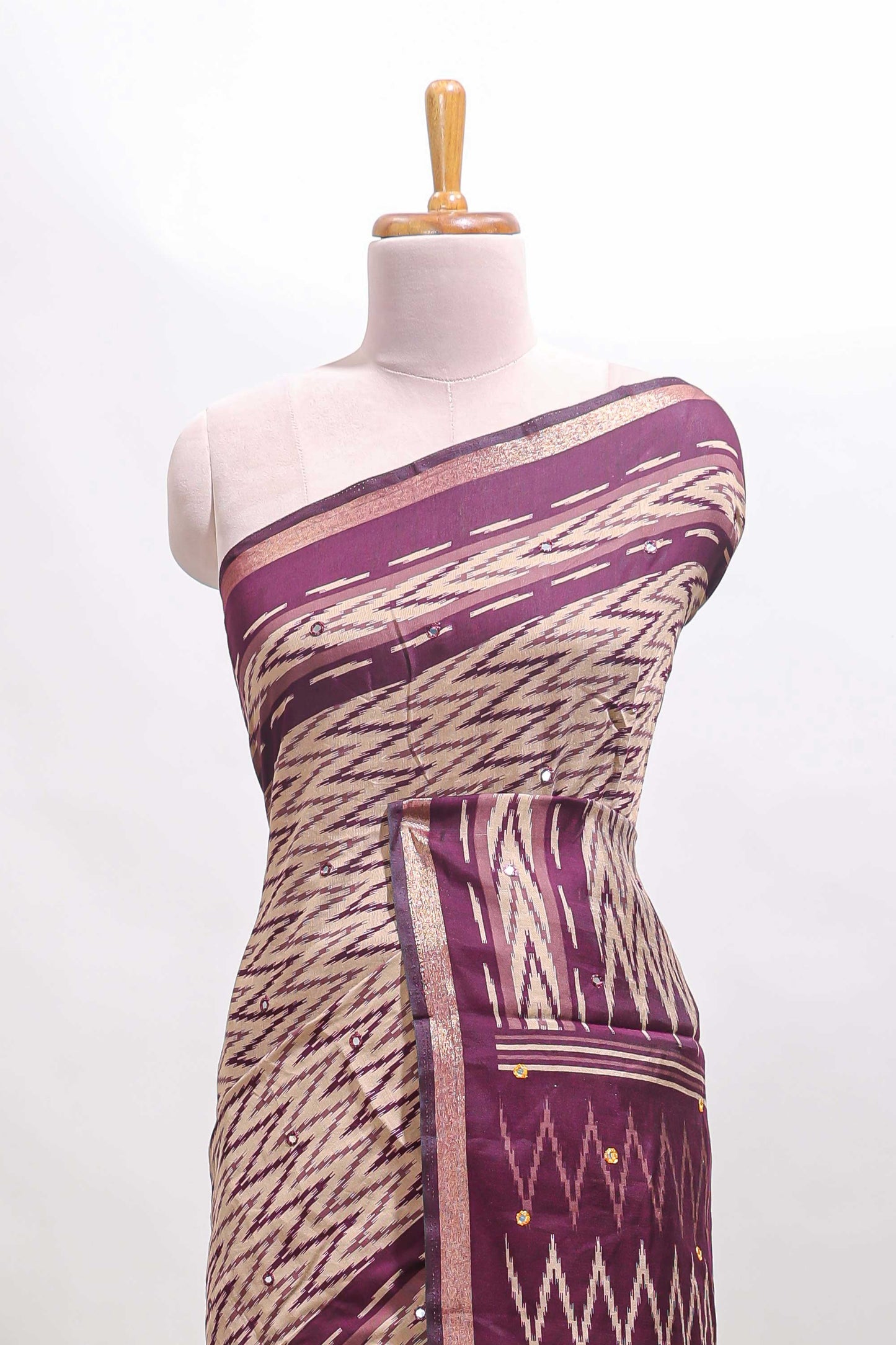 Beige chevron embroidery mirror work marsh mellow saree with contrast purple border and printed blouse