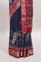 Blue peacock & floral design marsh mellow saree with contrast border and printed blouse