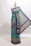Peacock blue floral motifs design marsh mellow saree with contrast border and printed blouse