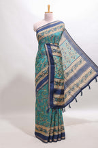 Peacock blue floral motifs design marsh mellow saree with contrast border and printed blouse
