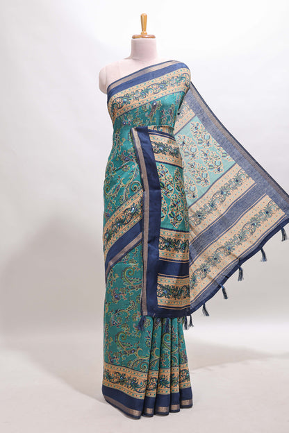 Peacock blue floral motifs design marsh mellow saree with contrast border and printed blouse