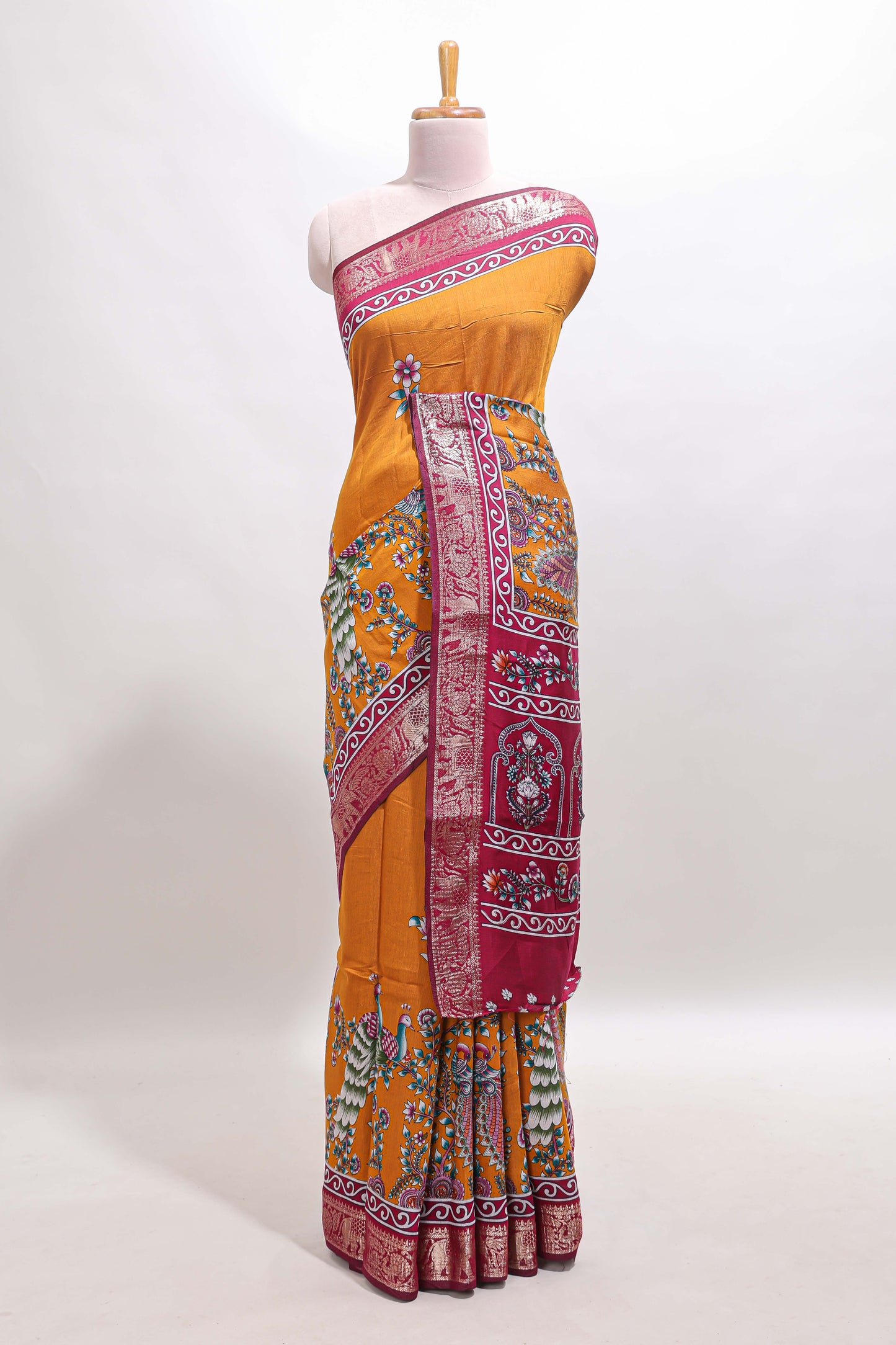 Mustard peacock & floral design marsh mellow saree with contrast border and printed blouse