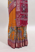 Mustard peacock & floral design marsh mellow saree with contrast border and printed blouse